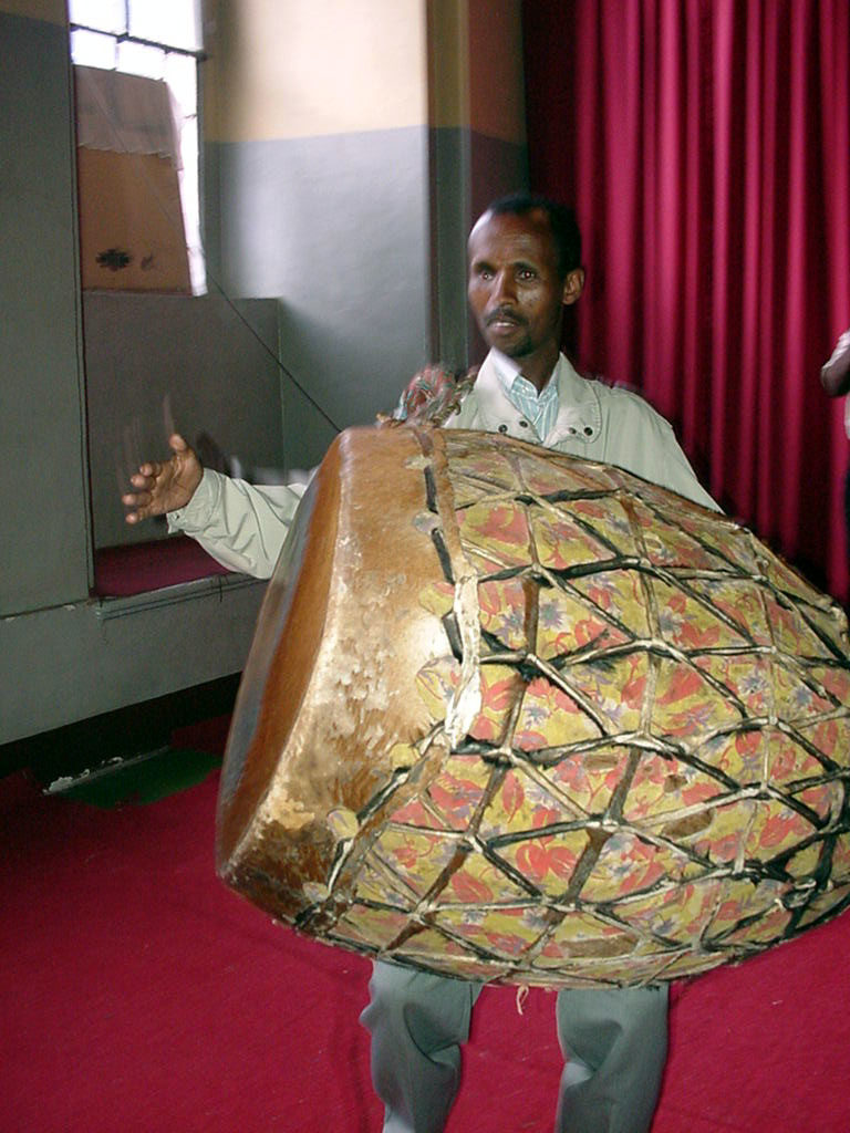 St. George's Cathedral, one of Addis Ababas fine Ethiopian Orthodox churches. This catherdral is where Haile Selassie was crowned emperor. Here, a tour guide demonstrates how to beat this enormous drum.